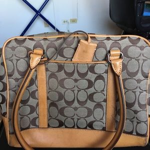 Coach purse 👜 pop of orange interior! Well loved!